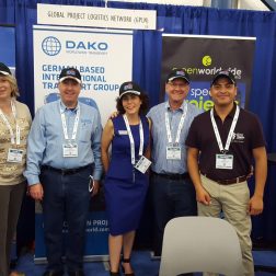 group of Global Shipping employees at a conference