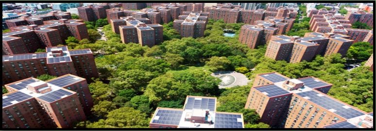 Aerial view of residential buildings in Manhattan covered with solar panels