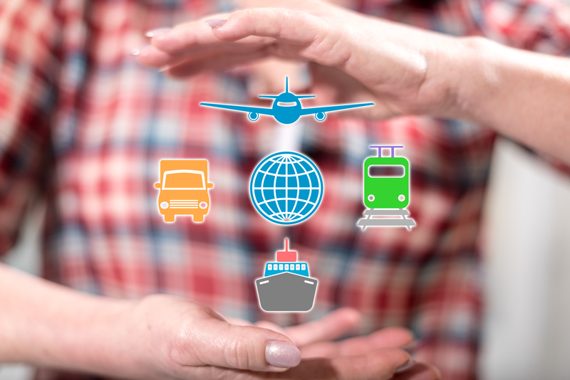 Global transportation concept between hands of a woman in background