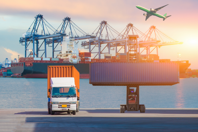 Import and Export Concept: Forklift truck, cargo container and plane at a dock yard against sunrise sky