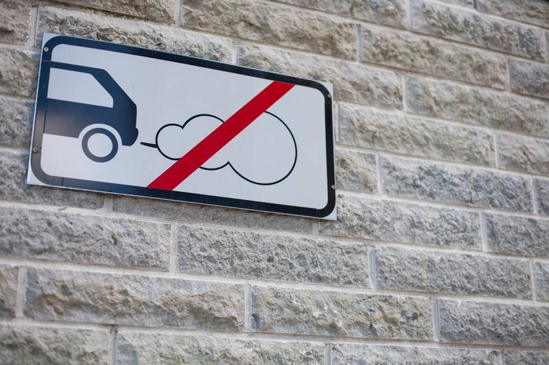 "No emissions allowed" sign depicting a car.